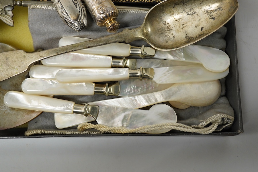 A boxed set of enamelled spoons, mother of pearl handled cutlery and similar serving spoons etc., serving spoon set 26cm long. Condition - fair to good